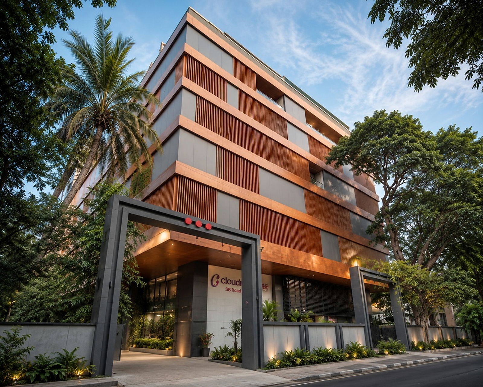 Contemporary building exterior with aluminium cladding and vertical façade elements.